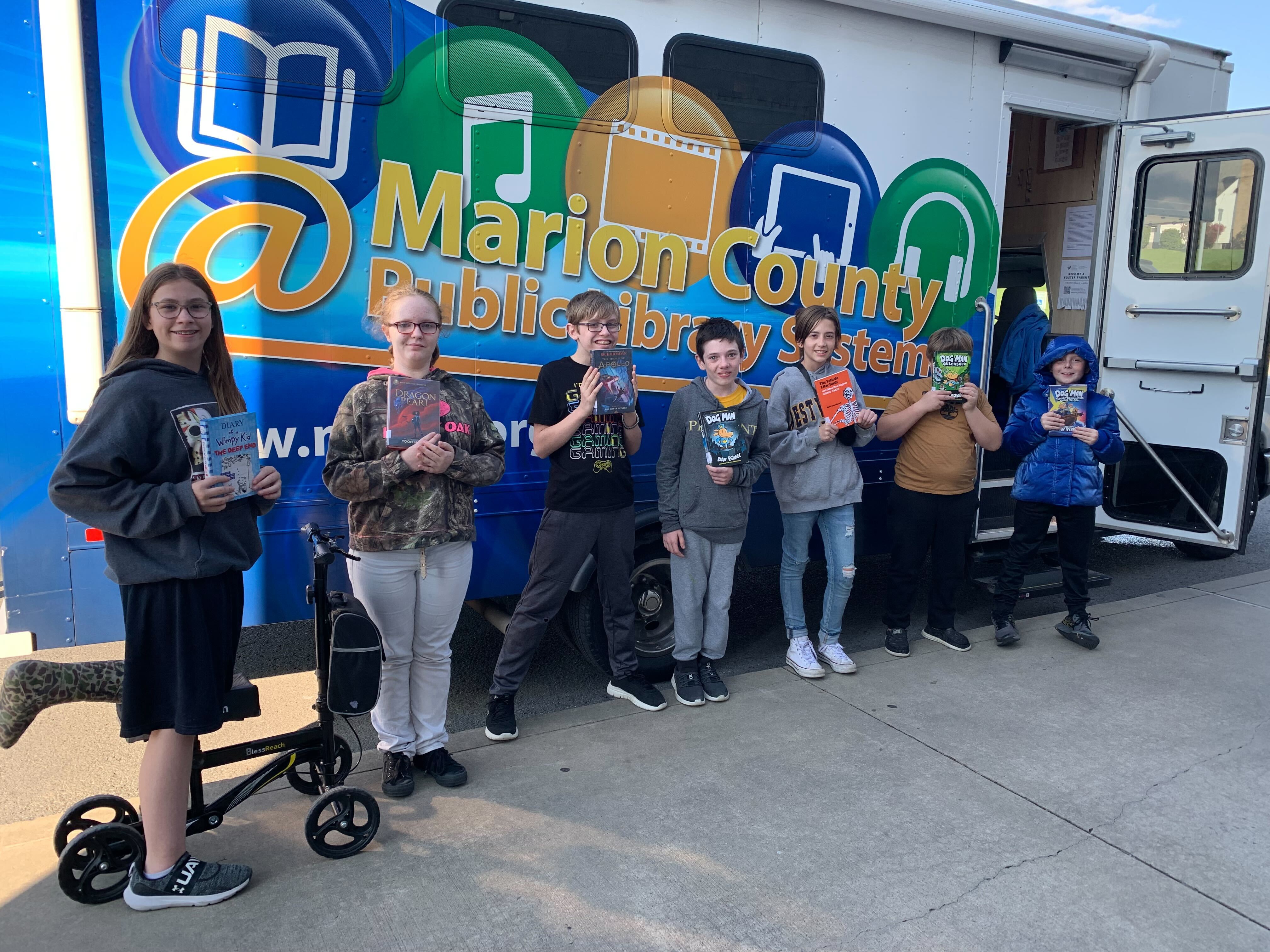 EFMS Flipside Students Pose with the MCPL Bookmobile